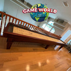 A Playcraft St. Lawrence 16' Shuffleboard Table in Chestnut with a Game World Planet logo above.