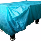 The legs of the DMI Sports American Legend Charger 52" foosball table peek from a blue cover.