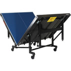 Stiga Premium Compact Table Tennis Table folded on wheels in playback position.