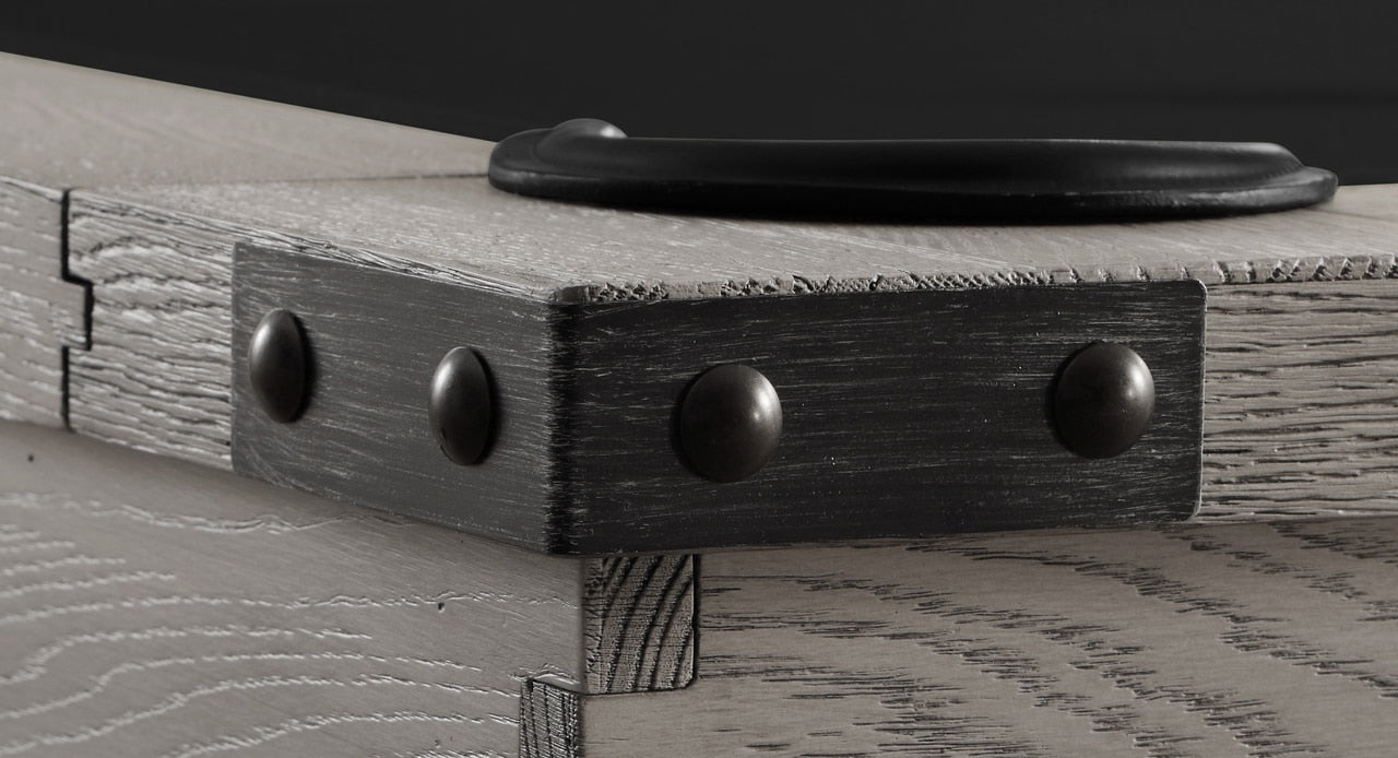 Close-up of a Playcraft Yukon River Slate Pool Table in Northern Drift with black metal trim.