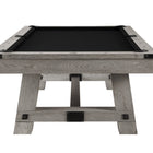 Playcraft Yukon River slate pool table in Northern Drift, black felt, sturdy legs, end view.