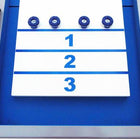 Playcraft Extera 12' silver outdoor shuffleboard table with four blue pucks at the top.