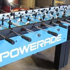 Warrior 8 Players Foosball Table with split bearing in a garage setting.