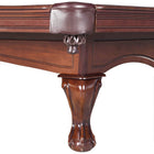 Close-up of Carmelli Augusta 8' pool table corner pocket and carved leg in walnut finish.