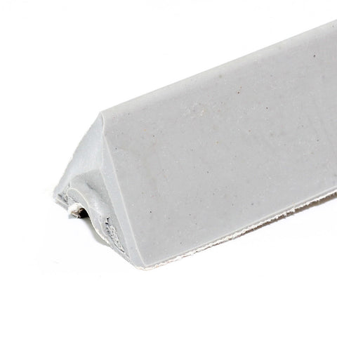 A white eraser, corner worn like Imperial Mark1 (48") K66 Cushion Rubber, on white background.