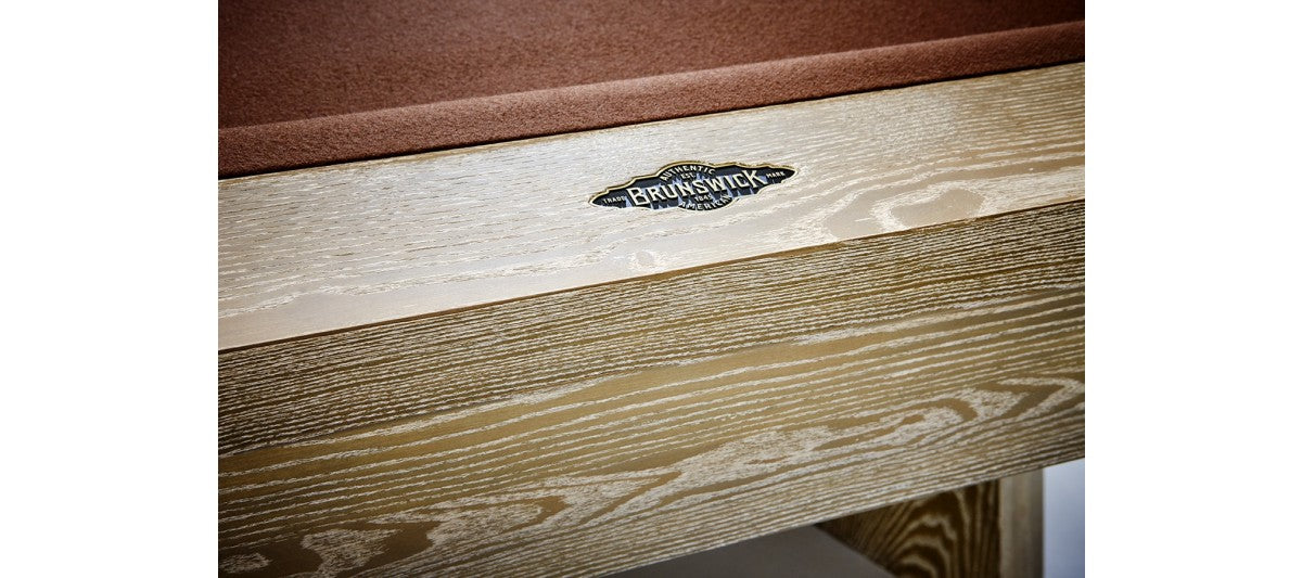 Brunswick Billiards Sagrada logo on Sandwashed 8' Slate Pool Table's wooden frame.