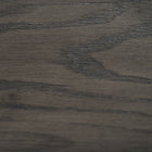 Close-up of dark wood grain, like on the Nixon Birdy 7' Slate Pool Table in Grayson Grey.
