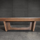 Nixon KAI 7' Slate Pool Table in Walnut by Nixon Billiards, features angled legs and a hollow center.