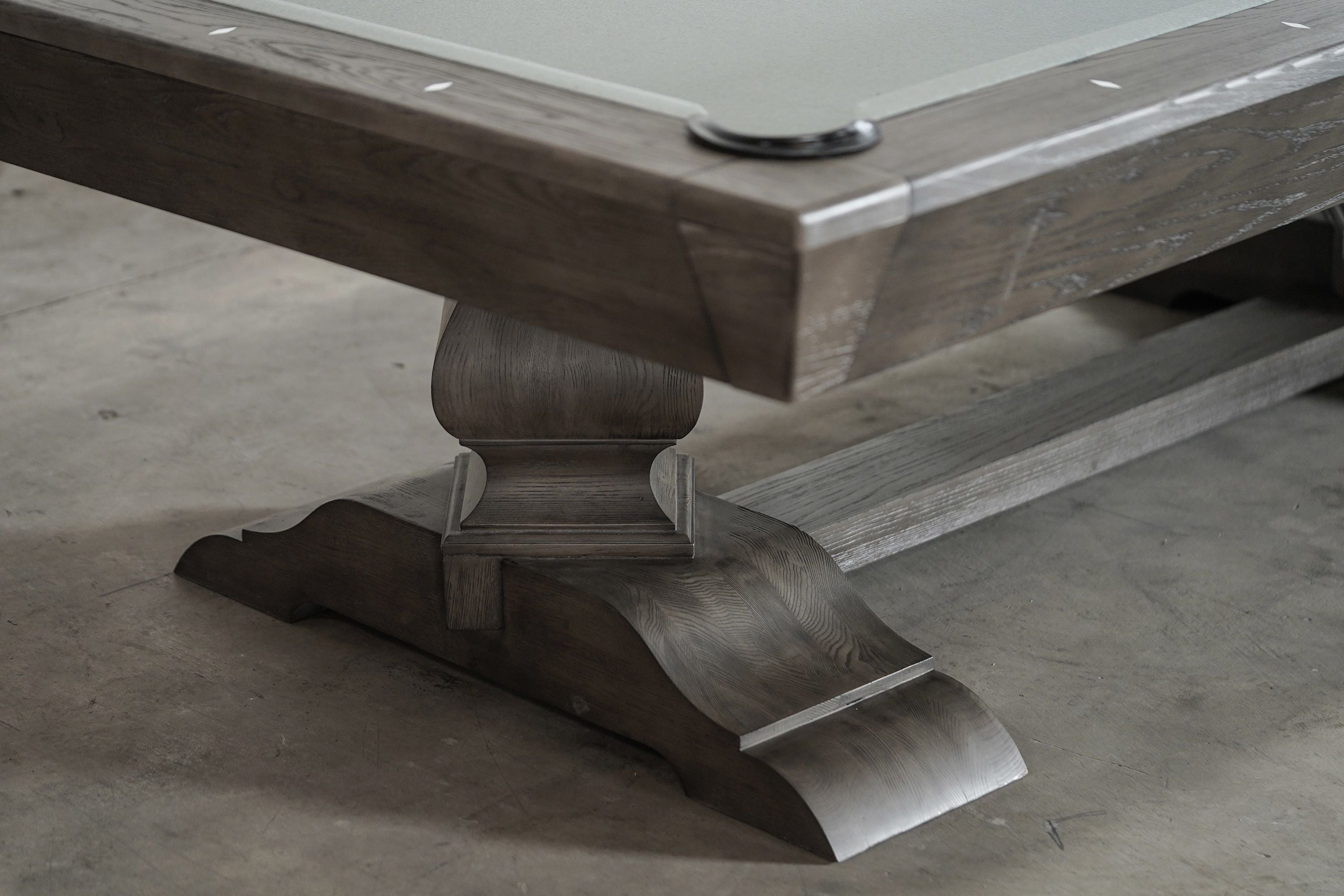 Close-up of Nixon Birdy 7' Slate Pool Table leg and base in Grayson Grey by Nixon Billiards.